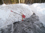 ice in driveway, axe and shovel
